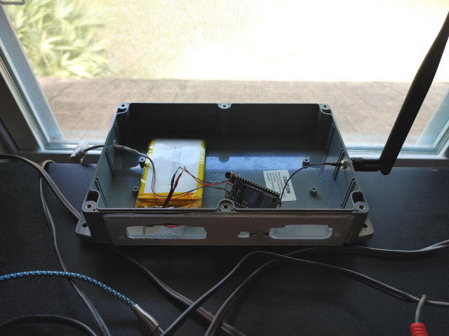 My HelTec V4 sits by the window during testing.  It will eventually live 30ft up a pine tree.